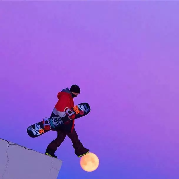 snowboarder walking on moon