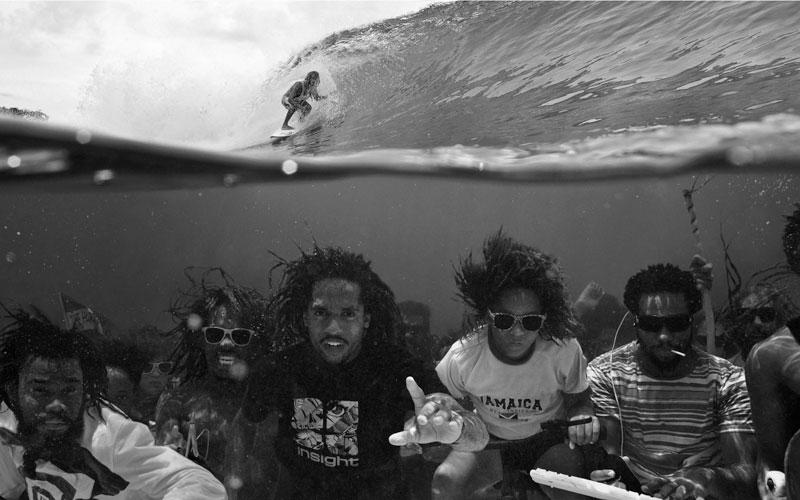 underwater group photo surfing above